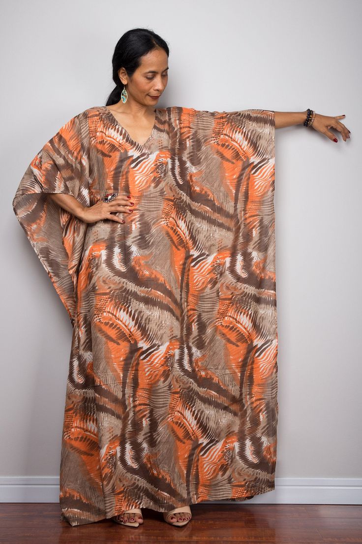 "Beach Kaftan Maxi Dress by Nuichan. Free upgrade express shipping worldwide! DRESS SIZE : Will work for US Small (size 6) up to 2XL ( size 20) * Chest : up to 46\" * Sleeve length : 16\" * Waist : up to 46\" * Hips : up to 46\" * Length : 54\" from shoulder to hem * Model chest : 32\", waist : 24\" hips : 35\" * Combined Height is 5\"6 > I'm 160 cm (5\"2) and I'm wearing 4\" heels in the pictures Summer Kaftan Cotton Maxi Dress, Loose fit holiday resort dress , Handmade women's beach cover u Casual Brown Beach Cover-up, Brown V-neck Dress For Beach Season, Casual Orange Maxi Beach Dress, Brown Printed Maxi Dress For Summer, Brown V-neck Maxi Dress For Beach, Casual Brown Maxi Dress For Vacation, Brown Tunic Kaftan For Spring, Spring Brown Tunic Kaftan, Casual Orange Beach Dress Cover-up