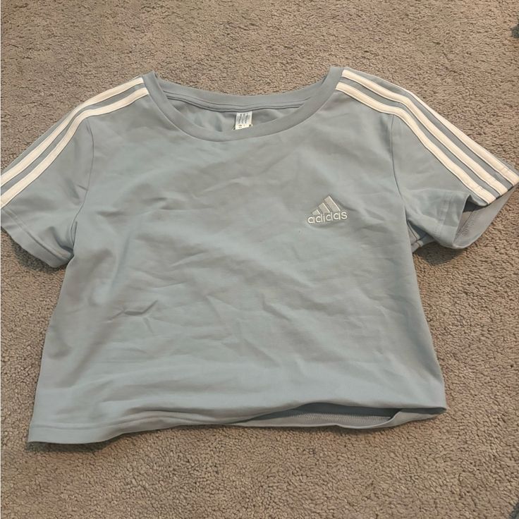 Brand New With Tags Size Medium Adidas Blue Tops With Three Stripes, Blue Adidas Tops With Three Stripes, Adidas Blue Three Stripes Top, Light Blue Cotton Sports Top, Blue Three Stripes Tops For Summer, Adidas Cotton Sports Top, Blue Cotton Tops With Three Stripes, Adidas Cotton Crew Neck Top, Basic Adidas Tops With Three Stripes