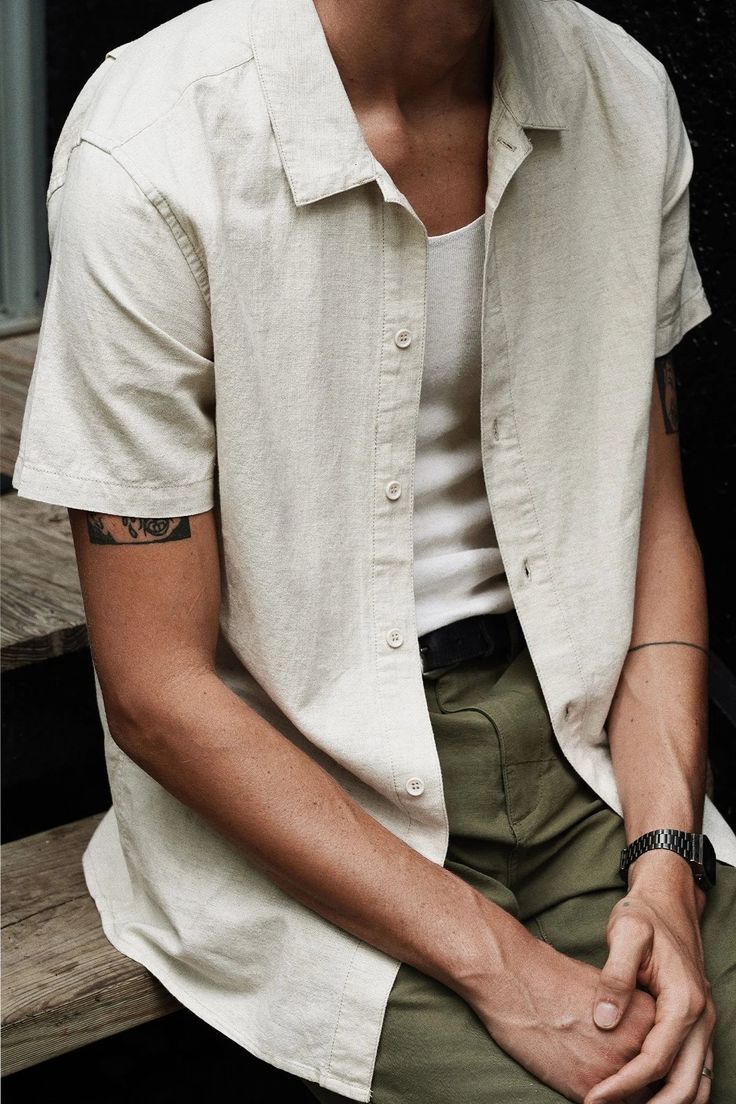 A year round staple spun from a breathable linen cotton blend fabrication, the Classic Linen Short Sleeve Shirt is a soft-touch standard fit made for laid back days. 55% Linen, 45% Cotton Shop other Rhythm styles here. Solid Cotton Camp Shirt For Summer, Summer Cotton Camp Shirt In Solid Color, Summer Cotton Camp Shirt, Casual Beige Short Sleeve Shirt With Camp Collar, Casual Beige Camp Collar Shirt, Casual Beige Button-up Camp Shirt, Casual Beige Shirt With Camp Collar, Solid Linen Camp Shirt For Summer, Summer Khaki Shirt