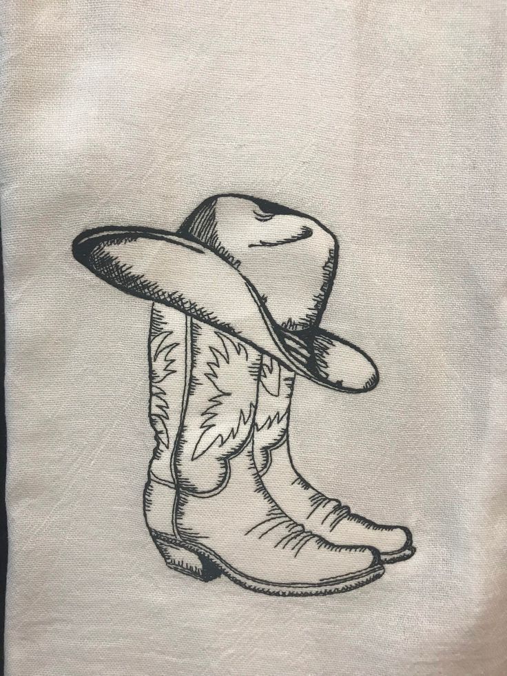 a drawing of a cowboy hat and boots