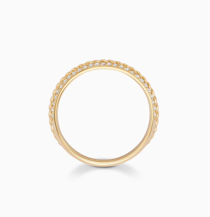 Striking in its elegant simplicity, this Twisted Gold Ring with Diamond Pavé honours the traditional charm of unadorned gold with a modern twist. Like all Ecksand jewels, this ring is handcrafted in our green atelier using high-end recycled gold. Accent diamonds: 0.20+ ctw, VS2+/F+ Setting: Grain setting Fine Jewelry Gold Plated Stackable Rings With Round Band, Gold Plated Stackable Rings Round Band Fine Jewelry, Formal 14k Gold Diamond Ring Tarnish Resistant, Refined Gold Round Band Jewelry, Classic Yellow Gold Stackable Rings With Half Eternity, Classic Yellow Gold Half Eternity Stackable Rings, Yellow Gold Open Band Stackable Rings, Formal 14k Gold Diamond Ring, Classic Gold Plated Yellow Gold Chain Ring