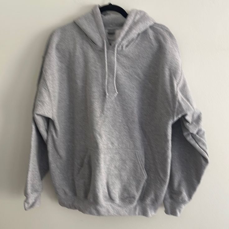 Gray Hoodie In Brand New Condition Never Worn Basic Hooded Winter Sweater, Basic Winter Hooded Sweater, Basic Winter Hoodie Sweater, Basic Long Sleeve Sweatshirt With Adjustable Hood, Casual Athletic Heather Sweatshirt For Winter, Athletic Heather Sweatshirt With Adjustable Hood, Athletic Heather Long Sleeve Sweatshirt With Drawstring Hood, Athletic Heather Long Sleeve Sweatshirt With Adjustable Hood, Athletic Heather Hooded Top With Ribbed Cuffs