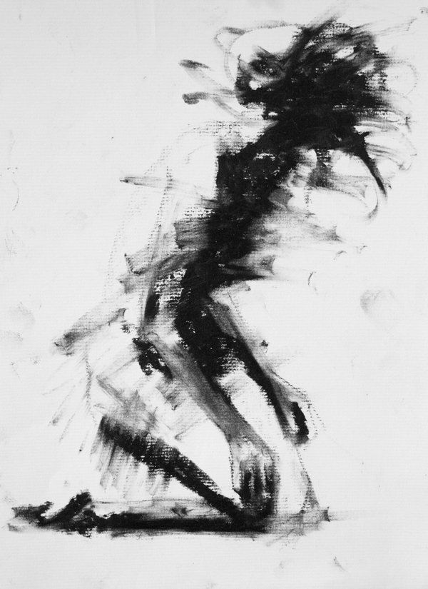 a black and white photo of a woman dancing