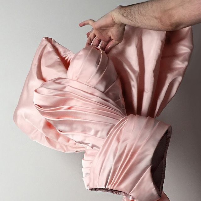 House of Dario Princiotta on Instagram: "Duchess satin corset-body I made in 2022 using the most delicate shade of pink.

The boned structure is entirely covered by draped duchess satin. Each pleat is carefully arranged and stitched down by hand.

This creation sold long ago. Stay tuned for upcoming pieces available for purchase in the next months.

#corset #corsetry #corsetmaking #corsetmaker #darioprinciotta #couturedesigner #costumedesign #fashiondesign #pinksatin #satin #drapedfashion #drapedcorset #draping #drapingdesigns #bonedbodice" Dario Princiotta, Drag Ideas, Wings Of Desire, Senior Thesis, Corset Fashion, Duchess Satin, Satin Corset, Photo Pin, Couture Designers