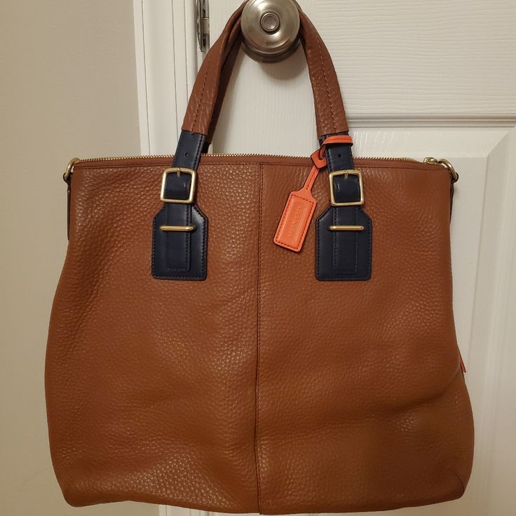 This Is A Beautiful Coach Leather Bag. Normal Wear And Tear From Using A Few Times (I'm The Only Owner). Short Handles For Carrying Along With The Removable Strap. Great Work/Business Bag. Super Stylish. Approximately 16 By 13 Inches. Gold Hardware. Pet Free, Smoke Free Home. Coach Pebbled Leather Bag For On-the-go, Pebbled Leather Satchel Bag With Handles, Pebbled Leather Satchel Shoulder Bag With Handles, Pebbled Leather Satchel Shoulder Bag, Everyday Pebbled Leather Bags With Handles, Everyday Pebbled Leather Bag, Pebbled Leather Shoulder Bag For Everyday Use, Coach Pebbled Leather Satchel With Detachable Strap, Tan Textured Leather Tote Satchel