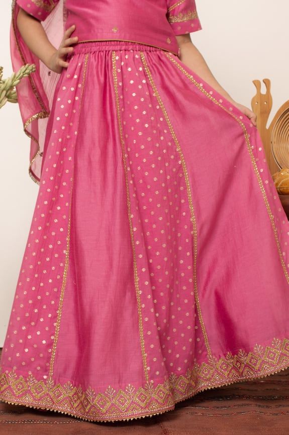 Pink chanderi silk can can attached lehenga with floral butti patterned panels. Comes with blouse and dupatta.
Components: 3
Type Of Work: Floral
Neckline: Round
Sleeve Type: Half
Fabric: Chanderi Silk, Lining: Cotton
Color: Pink
Other Details: 
Attached lining
Gota detail
Occasion: Festive and Wedding - Aza Fashions Types Of Work, Can Can, Girl Online, Aza Fashion, Sleeve Type, Lehenga, For Girls, Types Of Sleeves, Custom Made