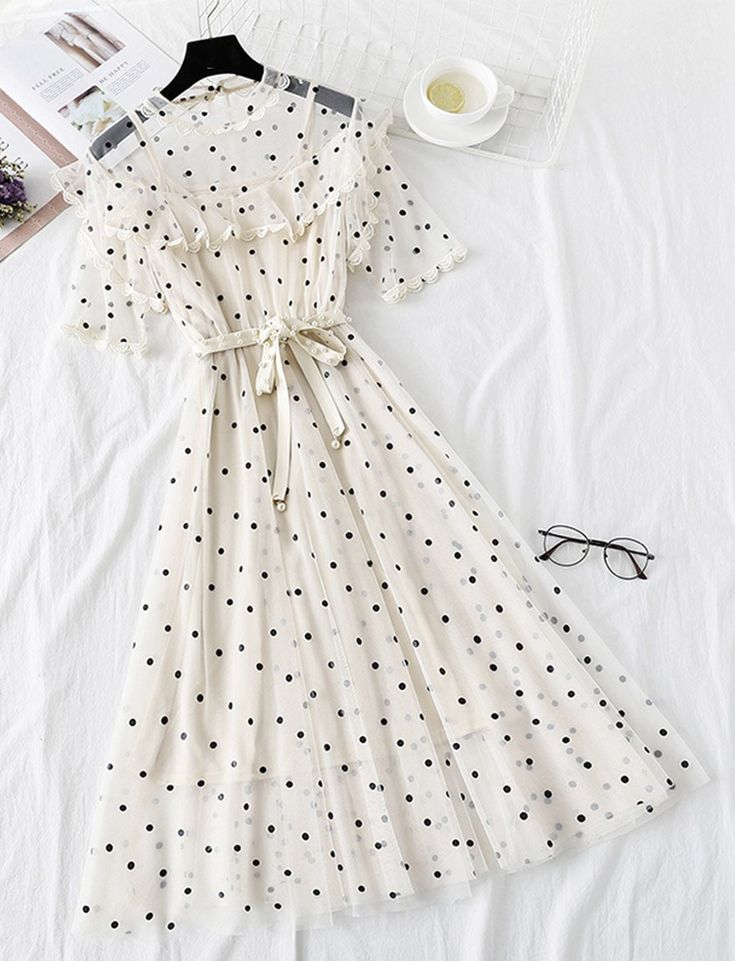 Cute polka dot short sleeve dress summer dress Fabric: tulle Color: pink,black, gray,white Size(cm): S, M, L, XL S length 106cm bust 90cm sleeve length 24cm M length 107cm bust 94cm sleeve length 25cm L length 108cm bust 98cm sleeve length 26cm XL length 109cm bust 102cm sleeve length 27cm Summer Ruffle Dress With Half Sleeves, Summer Midi Dress With Ruffles, Chiffon Short Sleeve Summer Dresses, Polka Dot Summer Dress With Short Sleeves, Polka Dot Mini Dress For Summer, Spring Knee-length Swiss Dot Dress, Summer Midi Dress In Polka Dot, Summer Midi Length Polka Dot Dress, Elegant Short Sleeve Swiss Dot Dress