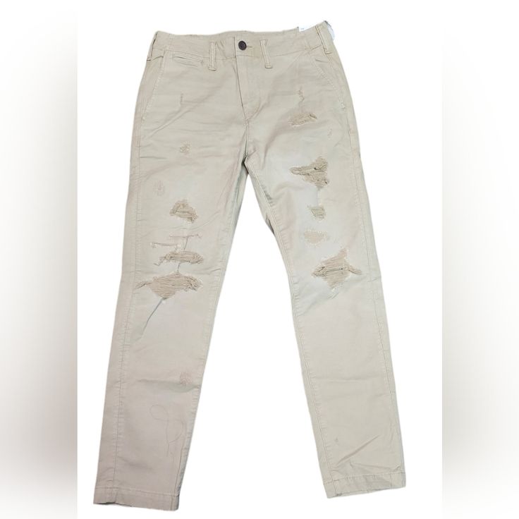 American Eagle Men's Slim Lived-In Distressed Flex Khaki Pants Size 28x30 Nwt Measurements: Waist 30" Length 37.5" Inseam 28.5" Material: 92% Cotton 5% Recycled Cotton 3% Elastane Upgrade Your Casual Wardrobe With These American Eagle Men's Slim Lived-In Distressed Flex Khaki Pants In Size 28x30, Brand New With Tags (Nwt). These Trendy Khaki Pants Feature A Slim Fit And Distressed Detailing, Providing A Modern And Effortlessly Cool Look. The Flex Fabric Ensures Maximum Comfort And Mobility, Maki Fall Distressed Cotton Pants, High Rise Ripped Cotton Pants, Distressed Tapered Leg Bottoms For Fall, Distressed Cotton Bottoms With Tapered Leg, Fall Distressed Tapered Leg Bottoms, Casual Distressed Tapered Leg Pants, Mid-rise Ripped Cotton Pants, Pants American Eagle, Cheap Men's Khaki T-shirt