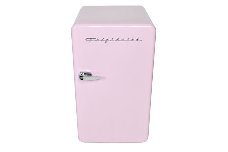 a pink refrigerator freezer sitting on top of a white floor