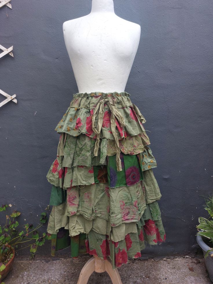 Upcycled Skirt Woman's Clothing   Shades of green, a lot of ruffles made of soft cotton in various floral,botanical prints. All hand dyed. Raw edges are part of the hippie design:)  Messy and romantic:)   Size Small/Medium/Large/XL Measurements: waist/hips up to 46(118cm) lenght 28(71cm) Are you looking for a different size or colours?                                                                                   I will be more than happy to design something just for you. :) Upcycled Skirt, Fairy Woodland, Floral Fairy, Hippie Designs, Skirt Floral, Hip Ups, Boho Skirts, Green Skirt, Floral Botanical