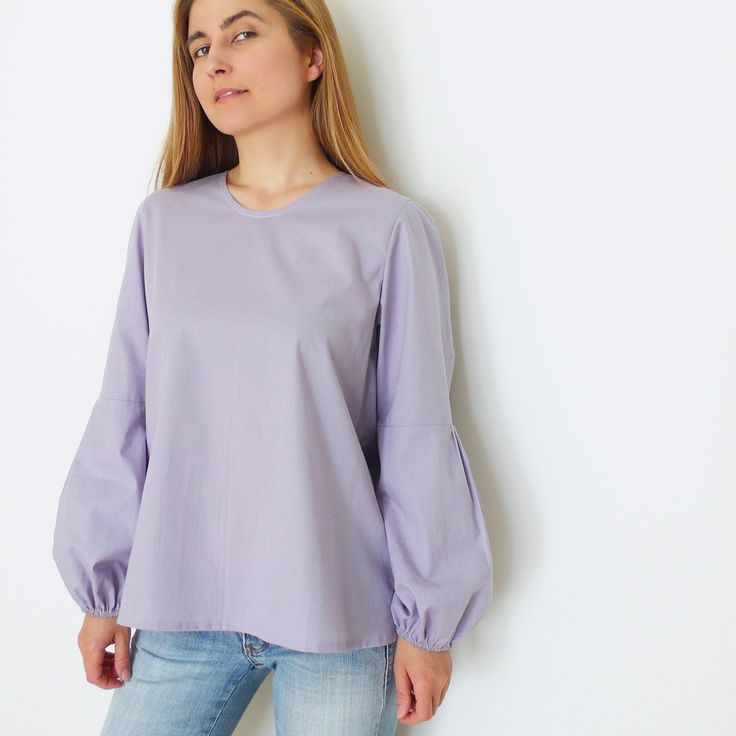 Digital Sewing Pattern for beginners for Women's Relaxed fit blouse with contrast voluminous/loose-flowing style sleeves, with elasticated ends tightly at the wrist. Billowy Long Sleeve Top With Gathered Sleeves, Elastic Shoulder Long Sleeve Tops For Work, Long Sleeve Tops With Elastic Shoulders For Work, Workwear Tops With Elastic Shoulders And Long Sleeves, Long Sleeve Stretch Blouse With Gathered Sleeves, Stretch Long Sleeve Blouse With Gathered Sleeves, Long Sleeve Blouse With Gathered Sleeves, Workwear Long Sleeve Blouse With Elastic Shoulders, Fall Long Sleeve Blouse With Elastic Shoulders