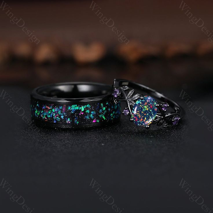 ICouples ring set galaxy black opal wedding rings set black gold twig leaf amethyst ring for women His and Her wedding band Promise ring gift -----Ring Information----- Metal Type: 925 sterling silver, Tungsten ✦ Her Ring 925 solid sterling silver with black rhodium finish (message me if you need other band color or metal, 10k/14/18k gold) Center stone: Lab black fire opal Stone size: 6x8mm oval cut (message me if you need other stones) Side stone: Amethyst ✦ Please feel free to contact me if yo Witchy Wedding Rings, Black Opal Wedding Ring, Black Wedding Ring Sets, Opal Wedding Ring Set, Black Opal Engagement Ring, Cute Promise Rings, Lab Black, Black Fire Opal, Matching Couple Rings