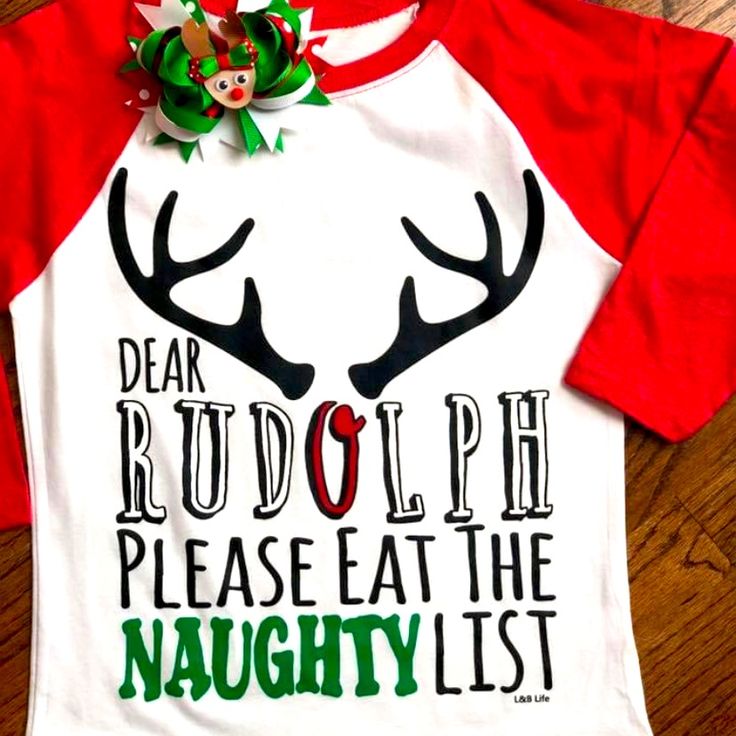 Dear Rudolph Please Eat The Naughty List Saying Across Front Of Top. A White Next Level Raglan Style With Red Sleeves. A Heat Transfer Of Rudolph Antlers With Cute Saying. Outfit Complete For The Girls A With Coordinating Bow That Is Included In Purchase. Shirt Could Be Unisex Too For Little Boys Without The Bow Of Course. Same Day Shipping If Purchases By 3pm Central. Smoke Free Home Boutique Christmas Shirt Ideas Vinyl For Kids, White Letter Print Top For Holiday, White Letter Print Tops For Holiday, Fun White Holiday Tops, White Letter Print Shirt For Holiday, Fun White Christmas Tops, Cute White Holiday Tops, Cute Red Holiday Tops, Cute White Top For Festive Occasions