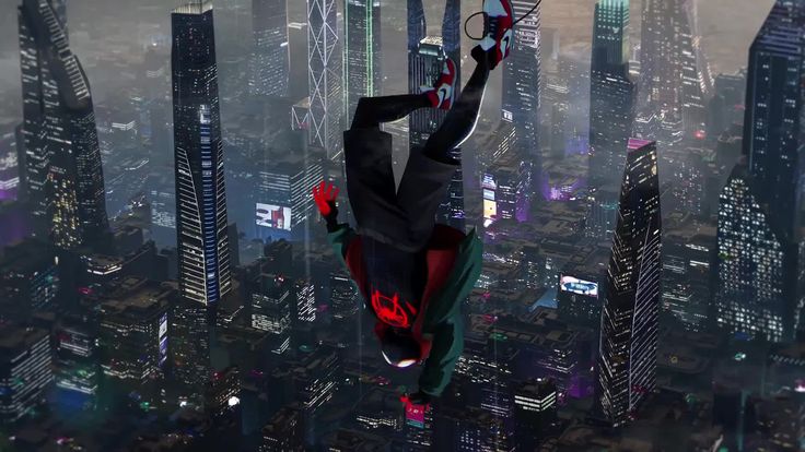 a spider man flying through the air over a city