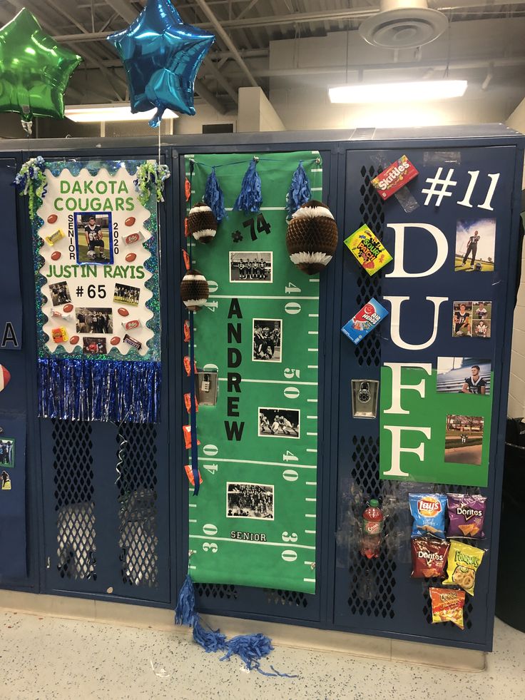 two lockers decorated with football themed decorations and balloons in the background, along with blue streamers