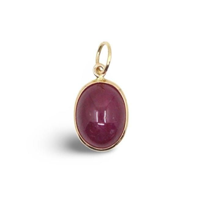 Material: 14k solid yellow gold (not gold plated or gold filled) Main Stone: Ruby Main Stone Color: Red Main Stone Shape: Oval Cabochon Main Stone Creation: Natural Stone Size: 10 mm x 8 mm How our jewelry is made: We start each piece of jewelry by carefully sorting through hundreds of gems to find the best looking and internally cleanest gemstone that we have. Once the gem is selected we touch up some of the faceting to ensure that the gem will look fabulous once it is set. Our setting process Yellow Gold Oval Cabochon Gemstones, Yellow Gold Gemstone Cabochons In Classic Style, Classic Yellow Gold Gemstone Cabochons, Classic Oval Ruby Gemstones, Oval Cabochon Ruby Gemstones, Classic Yellow Gold Polished Cabochons, Oval Yellow Gold Cabochons For Formal Events, Yellow Gold Polished Oval Cabochon Gemstones, Polished Yellow Gold Oval Cabochon Gemstones