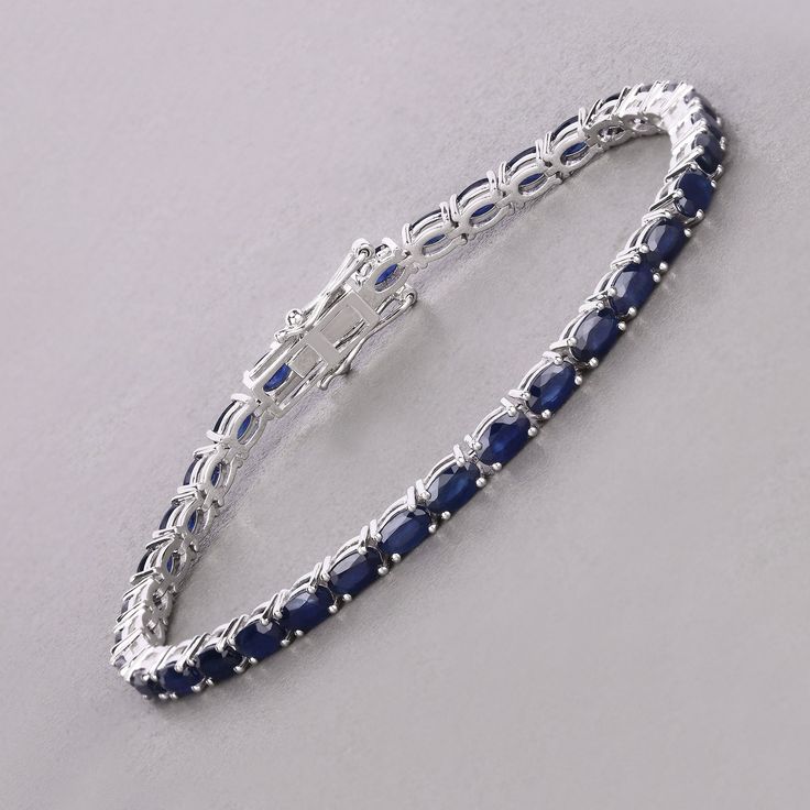 14k Gold Blue Sapphire Bracelet, Genuine Blue Sapphire Ovals Gold Bracelet for Women, Blue Sapphire Gold Tennis Bracelet, Gift for Her Celebrate the elegance of September with this luxurious 14K white gold tennis bracelet, featuring 7.48 carats of genuine oval blue sapphires. The deep blue sapphires, September's birthstone, are beautifully set in white gold, creating a striking and sophisticated piece. Designed with a secure box clasp, this bracelet offers both beauty and functionality. Perfect Luxury Blue Oval Diamond Bracelet, Classic Blue Sapphire Diamond Bracelet, Luxury Blue Gemstone Tennis Bracelet, Classic Blue Diamond Bracelet With Jubilee Design, Classic Blue Diamond Bracelet With Jubilee Style, Blue Sapphire Round Bracelet, Luxury Blue Sapphire Bracelets, Classic Blue Diamond Bracelet For Formal Occasions, Classic Blue Diamond Jubilee Bracelet