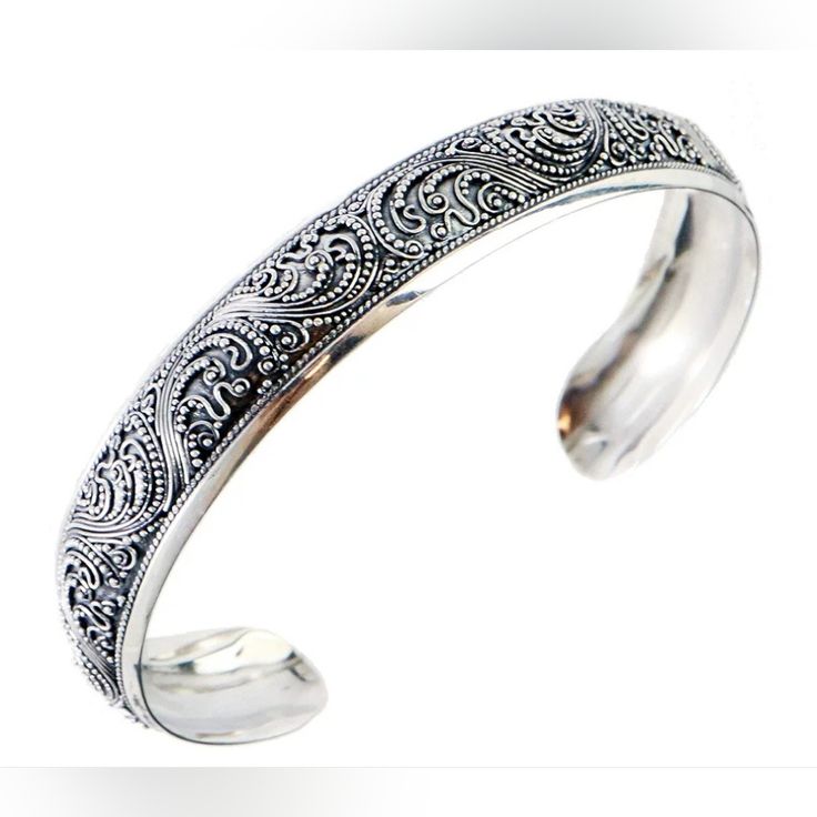 Rare Sterling Silver Handcrafted Cuff Bracelet By Jackiedesign. This Bracelet Is Carved With A Fluid Wave Pattern And Has Been Oxidized To Enhance The Design. Hand-Fashioned In Bali, Indonesia By Expert Silversmiths Using Delicate And Intricate Techniques Fashioning This Sophisticated Work Of Sterling Art. The Open End Allows For Some Adjustability By Being Bent Closer For A Smaller Wrist Or Opened Up For A Larger Wrist. A Stunning Cuff Bracelet. > Excellent Condition, Very Minor Scuffing Secondary To Being Pre-Loved (Photos Are Part Of Description) > Signed > 7.25" > W 12mm > 15.9g Your Satisfaction Is Our Mission Cheers! Measuremen Classic Cuff Bracelet With Intricate Design As Gift, Classic Intricate Design Cuff Bracelet As A Gift, Classic Intricate Cuff Bracelet As Gift, Classic Cuff Bracelet With Intricate Design For Anniversary, Classic Sterling Silver Bangle With Intricate Design, Classic Adjustable Cuff Bracelet With Intricate Design, Classic Silver Bangle With Intricate Design, Formal Adjustable Sterling Silver Bracelet With Oxidized Finish, Elegant Sterling Silver Bracelet With Oxidized Finish