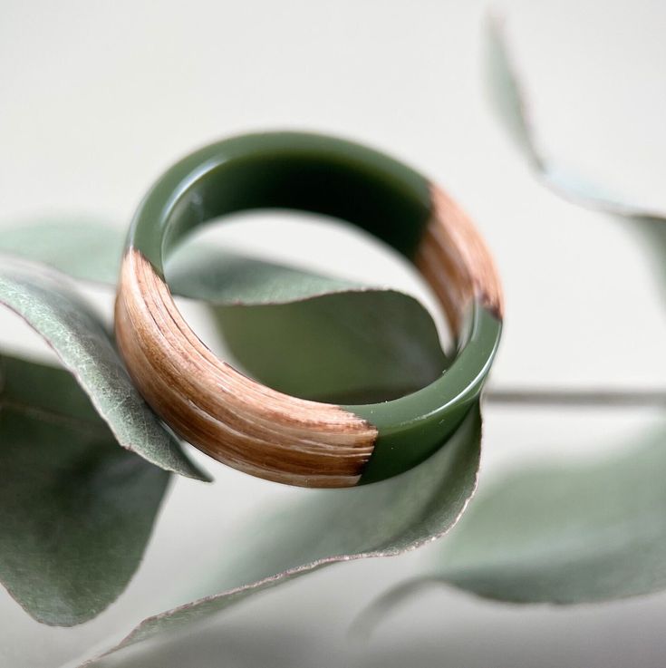 Natural Wedding Ring, Minimalist Wood Ring, Engagement Wood Jewelry, Engagement Wood Rings, Wood Ring, Wooden Ring, Unisex Ring, Wooden Jewelry, Natural Jewelry, Plum Wood The wooden ring is very beautiful minimalist style natural jewelry. It has very interesting form. Materials: The wooden ring is handmade from wood- birch wood. Surface of the woods are hand polished to make them brilliant. The woods are protected resin layer The wooden ring is very lightweight. It is as light as a feather, mak Wooden Jewelry Handmade, Wooden Fashion, Wood Rings Women, Ring Resin, Wooden Jewellery, Wedding Rings Photos, Natural Jewelry, Personalized Ring, Wood Ring