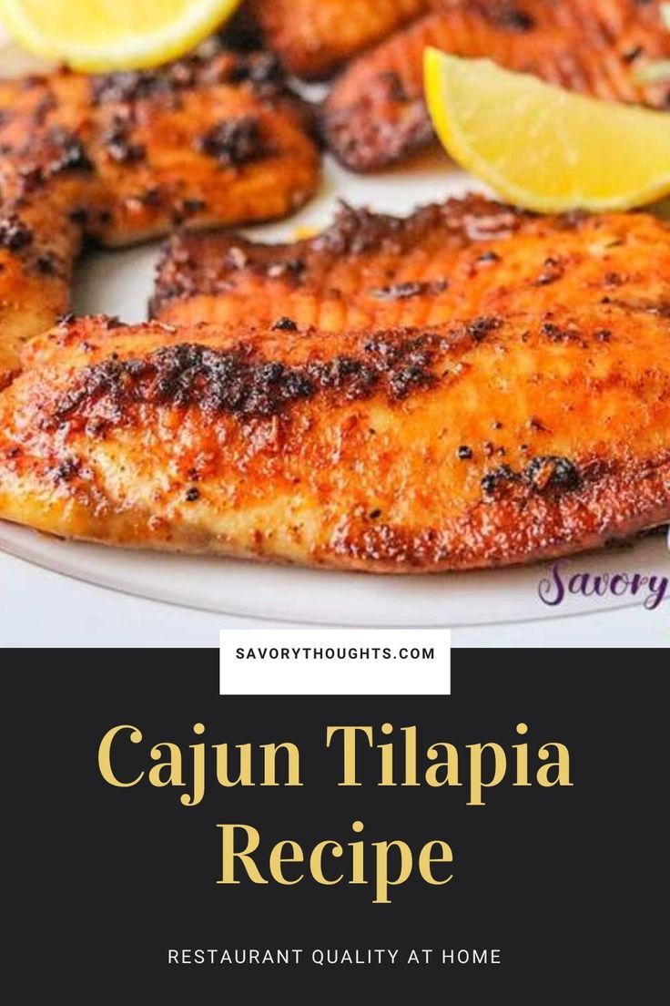 cajun tilapia recipe on a plate with lemons