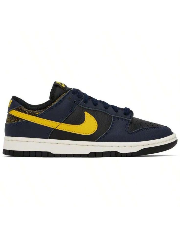 Nike 
Black & Navy Dunk Low Retro Sneakers 
Low-top paneled grained leather sneakers in black and navy. 
. Perforated detailing at toe 
. Lace-up closure 
. Logo patch at padded tongue 
. Padded collar 
. Swoosh appliqué at sides 
. Logo embroidered at heel collar 
. Crackled leather at heel counter 
. Mesh lining 
. Treaded rubber sole 
Please note that this item may be shipped only within North America. 
Supplier color: Black/Tour yellow 
Upper: leather. Sole: rubber. 
Made in Viet Nam. 
24101 Casual Athletic Shoes, Retro Sneakers, Dunk Low, Outdoor Shoes, Nike Black, Logo Embroidered, Leather Sneakers, Black Nikes, Black And Navy