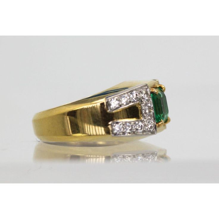 This is part of Chairish’s Fine Jewelry assortment.  This gorgeous David Webb Emerald and Diamond ring comes out of Paris and it is stunning. The ring features a gorgeous true Emerald Green Emerald square cut stone of approximately 1.25 to 1.50 carats and 18 Diamonds totaling approximately 0.90 carats. Metal: 18K Yellow Gold Weight: 13.8 Grams Stone: Square cut Emerald 1.25-1.50 Carats Stones:18 Diamonds .90 carats Size: 5-6 w/inner guard Dimensions: size 5-6.  This ring is double stamped Webb, Classic Emerald Ring With Princess Cut Diamond, Timeless Emerald Ring With Prong Setting Princess Cut, Timeless Princess Cut Emerald Ring With Prong Setting, Classic Emerald Diamond Ring With Accent Stones, Timeless Cubic Zirconia Emerald Ring For Anniversary, Luxury Emerald Cut Gemstones For Anniversary, Emerald Cut Diamond Fine Jewelry, Timeless Asscher Cut Gemstone Rings, Square Cut Sapphire Ring With Diamonds For Formal Occasions