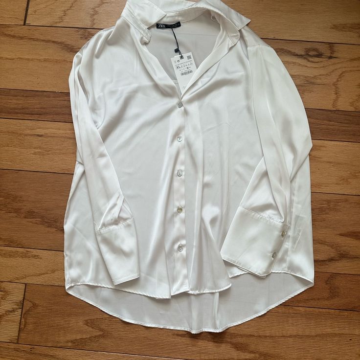 Zara White Silk Button Up Size Xl Oversized Fit Never Been Worn Tags Still Attached Oversized Formal Button-up Blouse, Oversized Formal Button-up Top, Oversized V-neck Blouse With Button Closure, Oversized Collared Elegant Tops, Elegant Oversized Collared Top, Elegant Oversized Button-up Shirt, Oversized Formal Blouse, Oversized Formal Blouse With Button Closure, Elegant Oversized Shirt With Button Closure