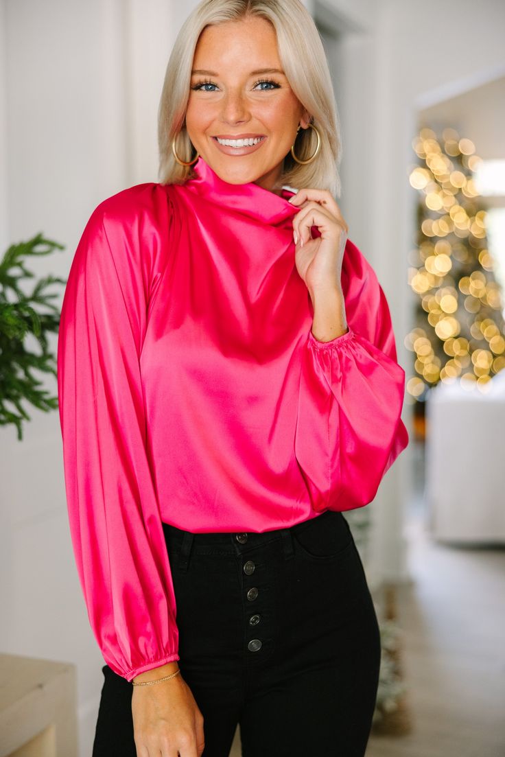 Embrace they joy that this blouse is going to bring! That satin fabric is so luxurious especially with that draped neckline! This bubble sleeve blouse is going to look amazing at the office or a nice restaurant! This blouse features long bubble sleeves, a draped cowl neck, a button keyhole back, and a sleek satin fabric. Material has no amount of stretch.Payton is wearing the small. Pink Satin Top For Evening, Chic Pink Fall Blouse, Chic Pink Blouse For Fall, Pink Fall Blouse For Night Out, Glamorous Pink Fall Tops, Glamorous Pink Tops For Fall, Pink Satin Top For Work, Formal Pink Satin Tops, Glamorous Pink Blouse For Fall