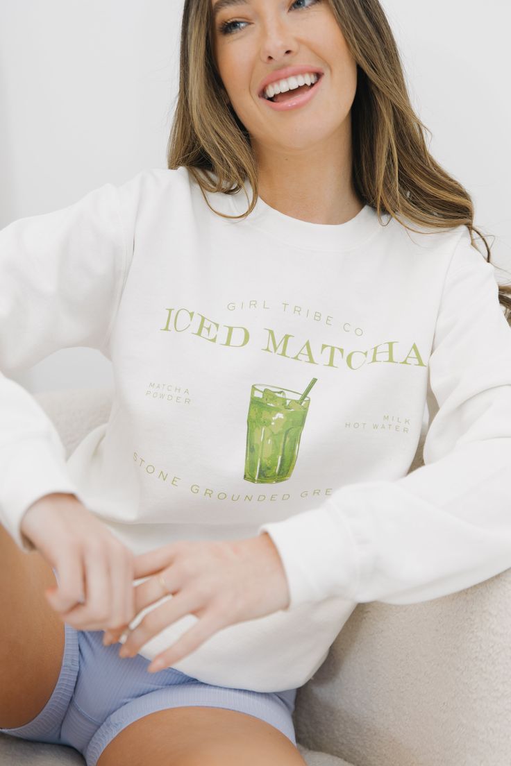 Matcha, anybody? This white Gildan crewneck sweatshirt, featuring sophisticated lettering and the cutest graphic, is perfect for all of our matcha girlies 🍵 GROUP ORDERS: Please use the code "CHEERSDISCOUNT" to get 10% OFF when you purchase 10 or more items from the Cheers Collection! CameronHeight: 5’9Bust: 34CShe is wearing a size small Trendy Green Sweatshirt With Text Print, Girl Tribe, Graphic Apparel, Girl Sweatshirts, Custom Embroidery, Clothes Collection, Sale House, Women Collection, Matcha