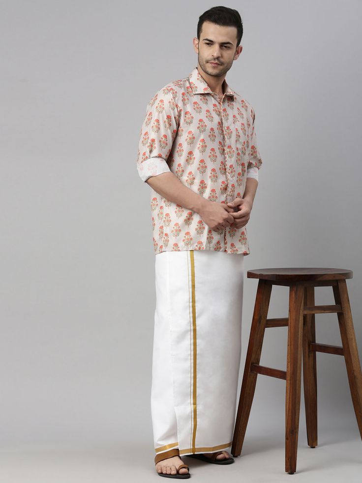 VASTRAMAY Men's Beige Floral Print Shirt And Mundu Set Discover the perfect blend of tradition and style with the VASTRAMAY Men's Beige Floral Print Shirt And Mundu Set. Ideal for festive occasions or cultural events, this set combines a finely tailored shirt with a complementing mundu, ensuring comfort and elegance in every detail. Features Floral print design High-quality fabric Comfortable fit Traditional yet modern appeal Specifications Color: Beige with floral print Material: Cotton blend S Traditional Cotton Shirt For Eid, Festive White Cotton Shirt, Semi-formal Cotton Traditional Wear, White Traditional Semi-formal Wear, White Semi-formal Traditional Wear, Traditional White Shirt For Festivals, Blend S, Floral Print Design, Floral Print Shirt