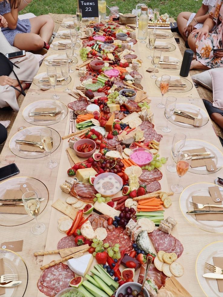 a long table with many different types of food on it