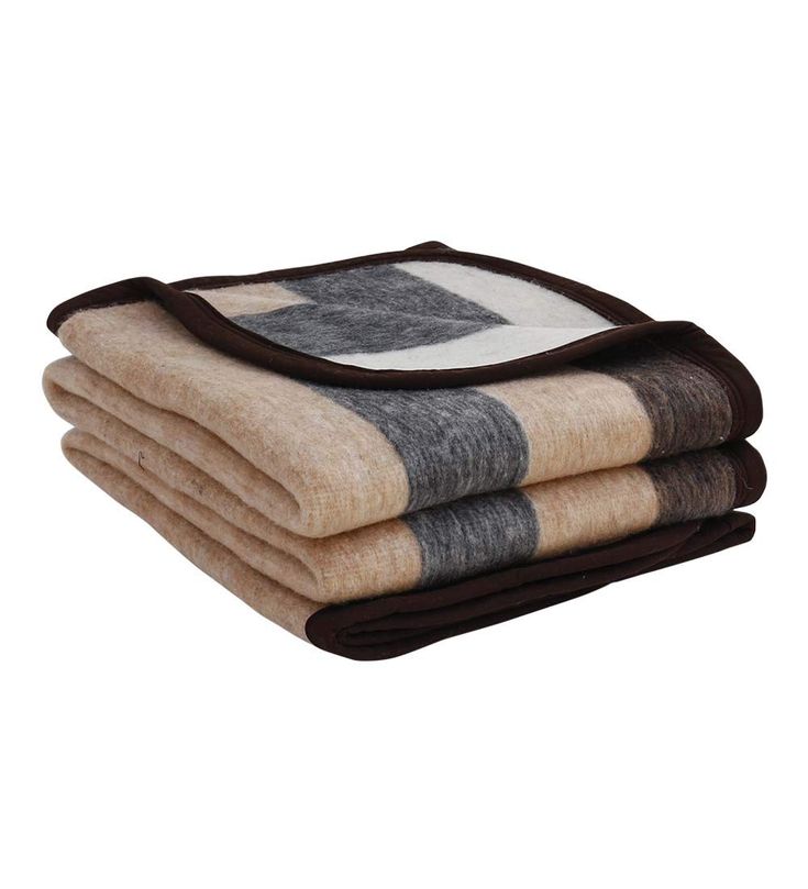 three blankets stacked on top of each other in brown and beige colors, with one blanket folded