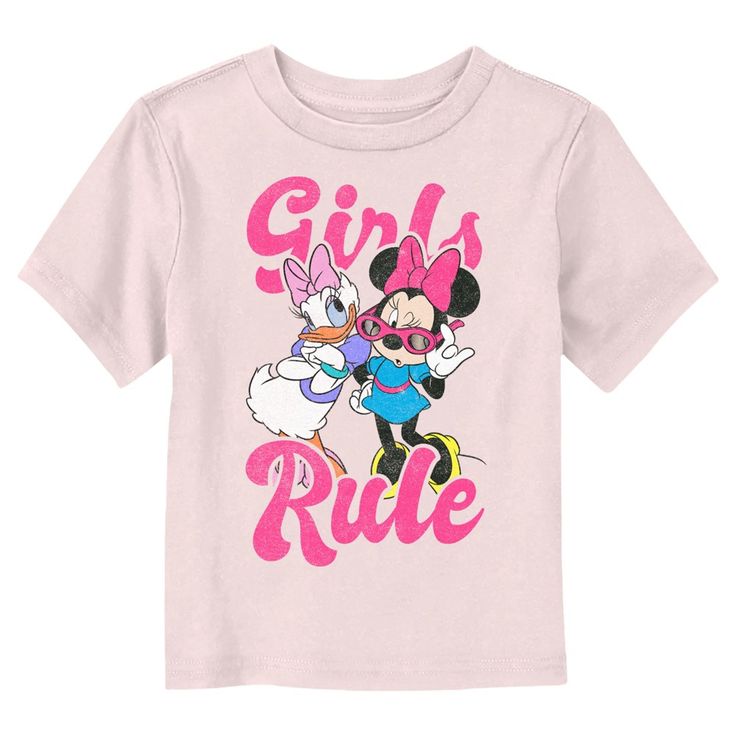 Who knew that dressing "mousey" could be so cute!? Celebrate Walt Disney's most iconic character with this officially licensed Disney Mickey Mouse and Friends Retro Girls Rule Toddlers' Graphic T-shirt! This cute design features Minnie Mouse and Daisy Duck posing cool in retro clothing and the inspirational phrase: "Girls Rule" printed in bright pink lettering across the front. Grab some new Mickey and Friends apparel for the youngest members of the family and make their next trip to the Disney Minnie Mouse And Daisy Duck, Girls Disney Shirts, Trending Graphic Tees, Retro Girls, Daisy Duck, Girls Rules, Retro Clothing, Graphic Tee Design, Mickey Mouse And Friends