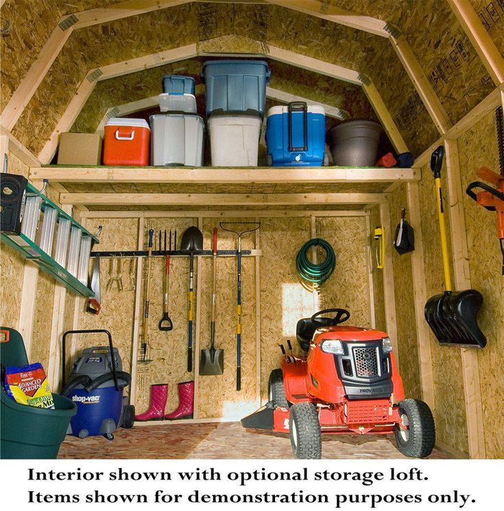 the inside of a storage shed with lots of tools