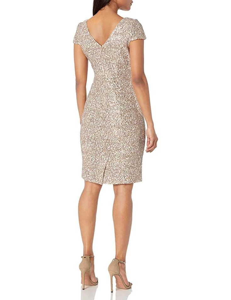 Walk in glamour and let all heads turn on you in this creation by Alex Evenings 82122241. Simple and elegant dress that ends in knee-length hem size. It is made with lace fabric and topped with some shiny sequin applique to give a subtle glow. It has simple features like short sleeves, V neckline and a fitted bodice that sums up to match the sheath silhouette. Charm everyone from all angles as you shine all night long in this Alex Evenings 82122241 masterpiece. Models are wearing Champagne and N Simple Knee Length Dress, Simple And Elegant Dress, Short Wedding Guest Dresses, Bohemian Beach Dress, Women Lace Dress, Striped T Shirt Dress, Formal Cocktail Dress, Alex Evenings, Halterneck Dress