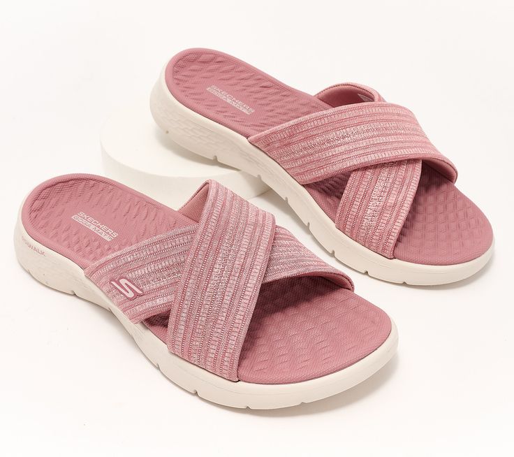 Your journey from the resort lobby to the sand or your neighbor's patio to the pool deck is comfier (and way cuter) in these flexible GoWalk slides with Goga Mat cushioning. From Skechers. Pink Slippers With Removable Insole For Beach, Pink Beach Slippers With Removable Insole, Lightweight Pink Sandals For Vacation, Lightweight Pink Vacation Sandals, Beach Slides With Arch Support, Adjustable Slippers With Arch Support For Vacation, Adjustable Lightweight Slides For Vacation, Adjustable Pink Slides For Vacation, Pink Beach Slides With Cushioned Footbed