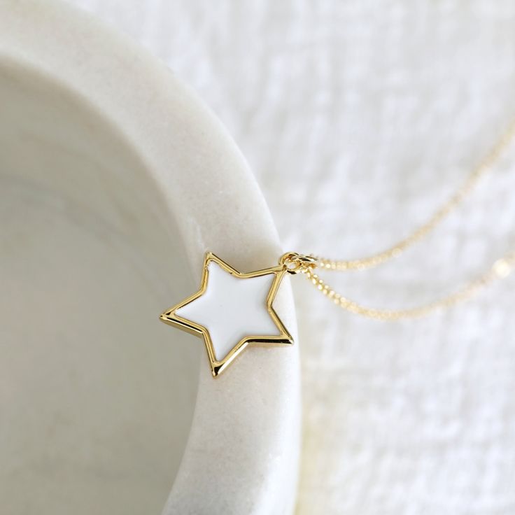 "Beautiful and lovely pink star charm necklace.  Made of dainty neon pink enamel star charm with skinny gold plated brass chain.  The simple and natural-looking dainty necklace is good for yourself or gift! Your necklace will ship in a Rudiana gift box. ♥ Gold Plated over Brass / White Enamel ♥  Chain length 14\" - 20\"   ♥  White charm 1/2\"   ♥  Creation Time: 1 - 3 days  ♥ US shipping transit time: 3-5days    ♥  See more Rudiana Accessories  Rudiana.etsy.com" Star Charm Necklace, Pink Star, White Star, Necklace White, Pink Enamel, Pink Stars, Jewelry Stand, Star Charms, Brass Chain