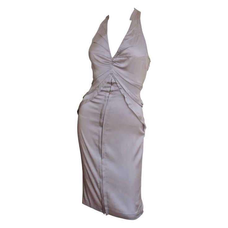 A fabulous lavender stretch silk dress by Tom Ford for Gucci S/S 2003 collection. It has a plunging front neckline and racer back with multiple seams emanating from it and the side seams drawing in the waist. It has a straight skirt with a slit at the back hemline, a matching invisible side zipper and the dress is unlined. Fits Extra Small, Small. Marked Italian size 38. Bust Open Waist 25-27" Hips 36-39" Length 38" Silk Bodycon Dress, Tom Ford For Gucci, Purple Silk Dress, Tom Ford Gucci, Silk Halter Dress, Lavender Silk, Color Lavanda, Gucci Dress, Girls Couture