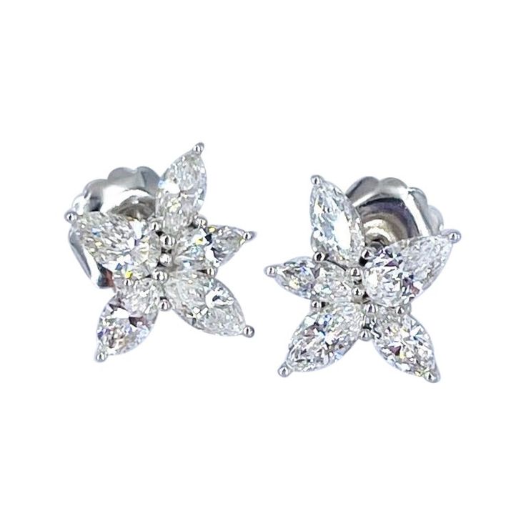 These glamorous earrings by J. Birnbach are a timeless style that adds elegance and sparkle to any ensemble. Perfect for a black tie affair or for a bride, pear shape and marquise diamonds create a lively starburst design. Crafted in 18K white gold, the total diamond weight is 3.39 carats. They are a post earring with a large back for comfortable wear. Marquise Diamond Earrings, Glamorous Earrings, Starburst Design, Black Tie Affair, Marquise Diamond, Pear Shape, Black Tie, Jewelry Earrings Studs, Timeless Style