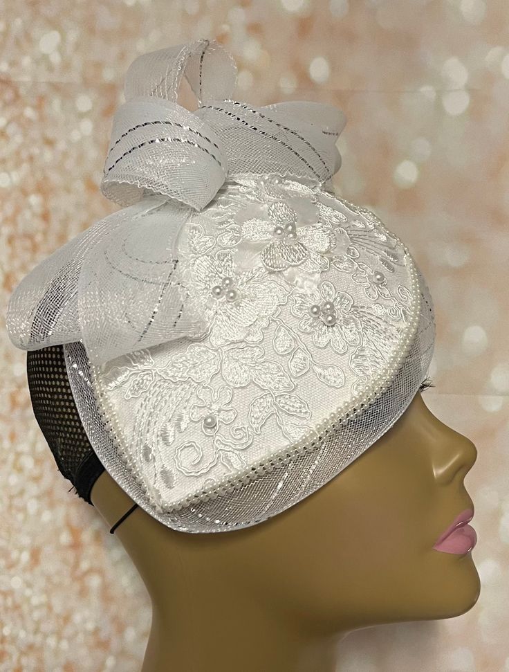 White Pearl Lace Teardrop Fascinator Half Hat, Church Head Covering, Tea Party, Kentucky Derby, Bride Hat, Wedding, and Special Occasions White pearl hat base with crinoline edge trimmed with pearls. Hat measures approximately 9.5 X7.5 PLEASE NOTE All items for Free Shipping will be shipped via USPS First Class Mail. Teardrop Fascinator, Pearl Hat, Wedding Hats For Guests, Pearl Lace, Mail Gifts, Hat Wedding, Bride Hat, Hat Base, Pearl And Lace