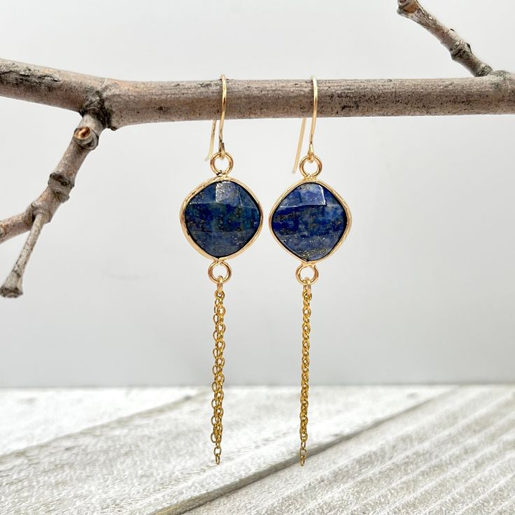 Lapis lazuli earrings, Gemstone earrings, Beaded blue stone earrings Unique dangle earrings featuring gorgeous faceted Lapis lazuli gemstones and three delicate 14 K gold filled chains.          These earrings are made with 14 K gold filled and their full length is about 2.6" ( 67 mm ). The Lapis charm is about 0.6" ( 15 mm ).  A stone of protection Lapis Lazuli quickly releases stress, bringing deep peace. It brings harmony, encourages self-awareness, allows self-expression and reveals inner tr Blue Dangle Jewelry With Adjustable Chain, Blue Nickel-free Linear Earrings For Gift, Blue Gemstone Dangle Earrings, Lapis Lazuli Dangle Earrings For Pierced Ears, Lapis Lazuli Dangle Earrings With Natural Stones, Lapis Lazuli Natural Stones Drop Earrings, Sapphire Dangle Earrings For Gifts, Lapis Lazuli Dangle Jewelry, Unique Dangle Earrings