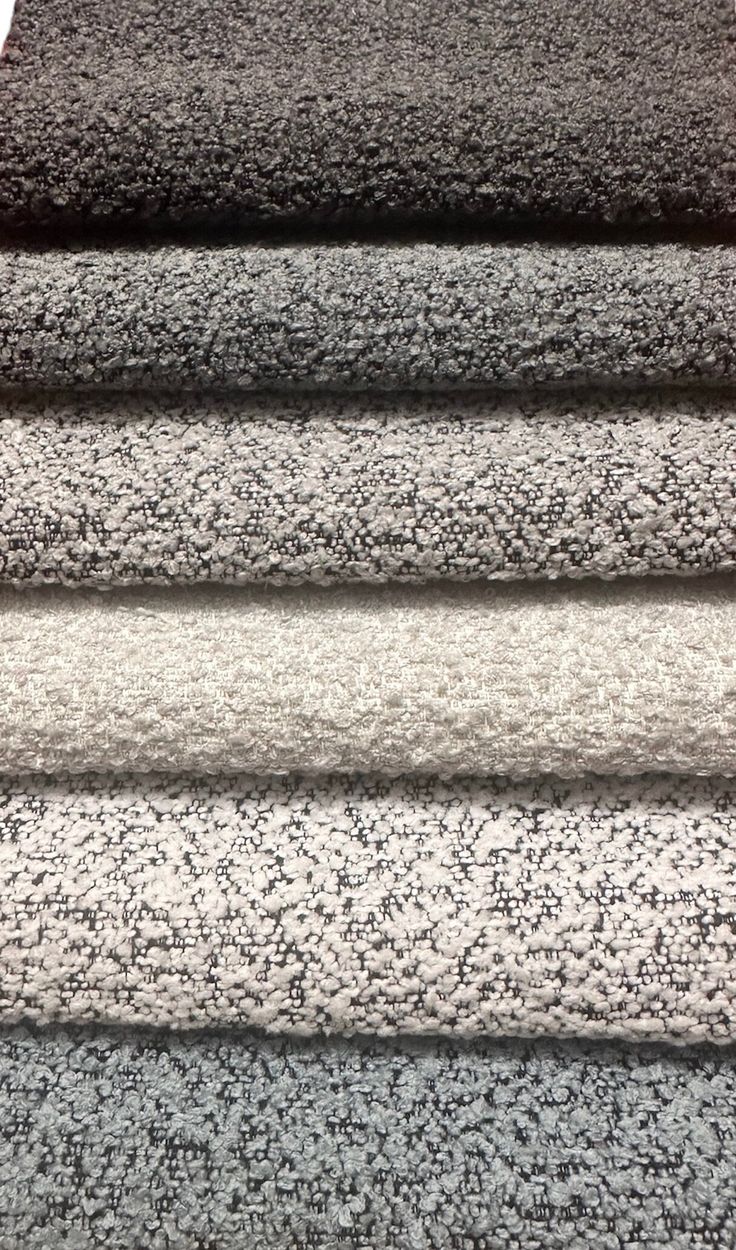 carpet samples are stacked on top of each other