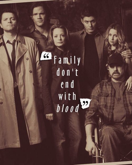 a group of people standing next to each other with the words family don't end with blood