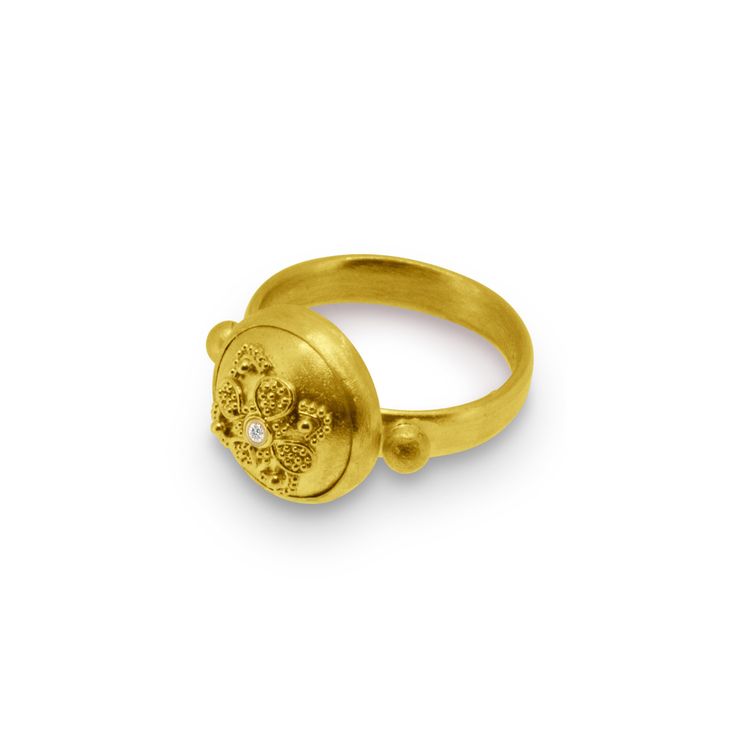 Gold Ring - Memories of the ancient world in this unique 22k gold granulated ring. A 3.4 mm diamond set in the center pays homage to the famous oracle who was central to life in Ancient Greece. Created using the highly technical granulation technique, each element is precisely crafted, often over the course of several weeks, ensuring the exceptional quality that is the benchmark of the work of Nancy Troske. Signed on the back. Hand fabricated in your size and signed on the back. Ceremonial Gold Diamond Ring, Ceremonial Yellow Gold Diamond Ring, Ceremonial Yellow Gold Jewelry With Single Cut Diamonds, Heirloom Yellow Gold Diamond Ring For Ceremonial Occasions, Heirloom Gold Engraved Ring With Rose Cut Diamonds, Elegant Gold Diamond Ring For Ceremonial Occasions, Spiritual Gold Diamond Ring For Anniversary, 14k Gold Byzantine Round Ring, 14k Gold Byzantine Style Round Rings