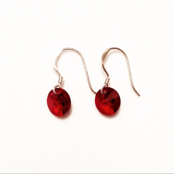 These Earrings Are Made Of .925 Sterling Silver And Dazzling Swarovski Crystal. French Hooks Are Stamped 925 And Earrings Come In A Cotton Filled Gift Box Earrings Are 2cm Long And The Crystal Is 8mm In Diameter. 2 For 20 Gorgeous Red Color. Comes In Cotton Filled Gift Box. Red Sterling Silver Dangle Crystal Earrings, Red Sterling Silver Drop Crystal Earrings, Red Sterling Silver Crystal Drop Earrings, Hypoallergenic Sterling Silver Crystal Earrings For Party, Sterling Silver Faceted Crystal Earrings For Gift, Faceted Sterling Silver Crystal Earrings Gift, Classic Red Sterling Silver Earrings, Red Sterling Silver Birthstone Earrings, Red Birthstone Sterling Silver Earrings