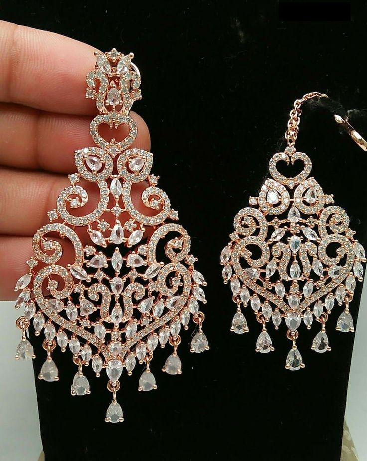 Elegant Cubic Zirconia Chandbalis For Festive Occasions, Festive Chandbalis With Stone Work And Cubic Zirconia, Festive Chandbalis With Cubic Zirconia Stone Work, Festive Cubic Zirconia Chandbalis With Stone Work, Reception Chandelier Earrings With Stone Work, Bollywood Bridal Earrings With Stone Work, Bollywood Style Bridal Diamond Earrings With Stone Work, Bollywood Style Jeweled Bridal Earrings For Reception, Bollywood Diamond Bridal Earrings With Stone Work