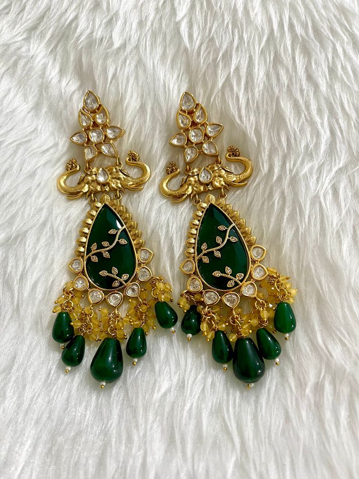 Sabyasachi inspired uncut Polki Kundan designer earrings. Gold plated. Semi precious stones and beads. Length 13cm If have any queries please ask. Elegant Chandbalis For Festivals, Elegant Designer Chandbalis For Festivals, Bollywood Style Chandbali Earrings For Designer Wear, Elegant Chandbalis With Cutdana For Designer Wear, Elegant Designer Chandbalis With Meenakari, Traditional Chandbali Jhumkas For Designer Wear, Elegant Designer Meenakari Chandbalis, Elegant Meenakari Chandbalis For Designer Wear, Designer Chandbali Jhumkas With Stone Work