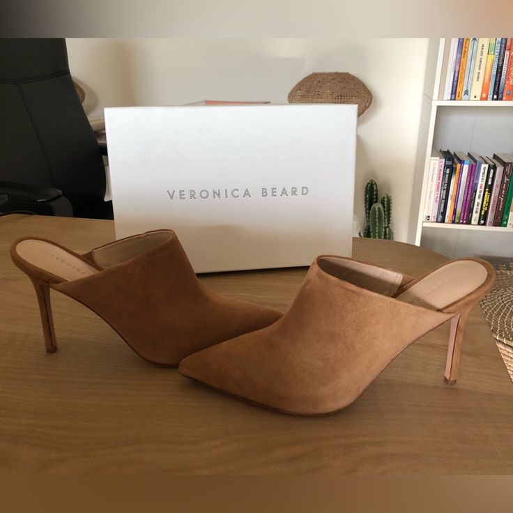 Veronica Beard Lisa Suede Heel Mules Tan, Brown Color “Latte Suede” Women’s Size 9.5 New In Box Slip On Pointed Toe Leather Lining / Leather Sole Suede Upper Heel About 3.75” The Dust Bag Included In Box Sold Out Online! Retails $395 Tags: Minimalist , Contemporary, Quiet Luxury, Elegant, Classic, Neutral, Closet Staple, Suede, Leather, Pointy Heel, Tan, Brown, Clogs, Mules, Heel Mules, Business Casual, Veronica Beard, Luxury , The Sticker Removed From Bottom Of The Heel, A Bit Sticky Due To Res Suede Closed Toe Sandals For Work, Medium Width Suede Sandals With Pointed Toe, Suede Closed Toe Party Mules, Suede Closed Toe Mules For Party, Party Suede Closed Toe Mules, Brown Almond Toe Mules For Party, Pointed Toe Suede Sandals With Leather Sole, Chic Suede Sandals For Work, Chic Brown Sandals For Office