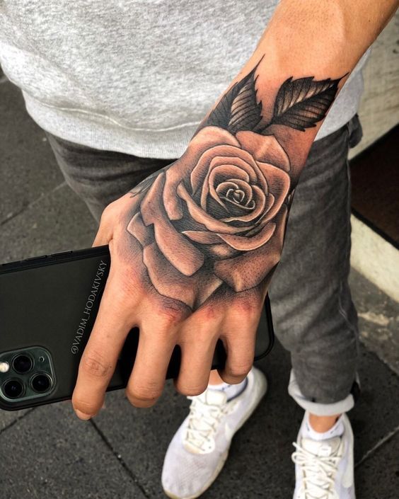 |#tattoo #handtattoo #tattoos #rosetattoo #tattoorose 1407 Rosen Tattoo Mann, Mens Body Tattoos, Rose Hand Tattoo, Rose Tattoos For Men, Hand Tats, Guitar Tattoo, Forarm Tattoos, Forearm Sleeve Tattoos, Half Sleeve Tattoos For Guys