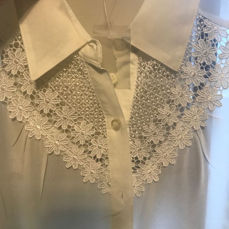 White Blouse With Nice Embroidery. Size Medium. It Has No Stains, No Holes, No Rips And No Pilling. The Blouse Is New But I Removed The Tags Thinking That I Would Wear It, You Can Still See Part Of The Tag In It. Blouse Is Very See Through On The Non-Embroidery Part. Summer Collared Lace Tops, Collared Lace Tops For Summer, Summer Lace Collared Tops, Collared Blouse With Floral Embroidery For Daywear, Floral Embroidered Collar Blouse For Daywear, Floral Embroidery Collar Blouse For Daywear, Daywear Blouse With Floral Embroidery And Collar, Floral Embroidery Blouse With Collar For Daywear, Summer Collared Lace Blouse